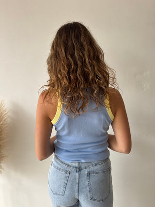 Yellow details blue top