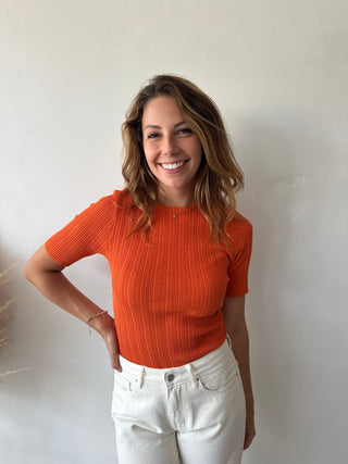Orange ribbed top