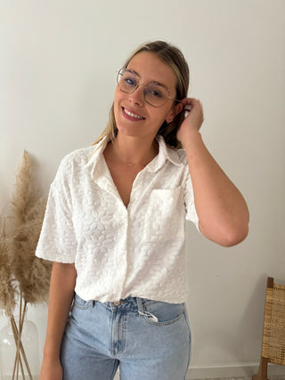 White flowers button top