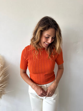Orange ribbed top