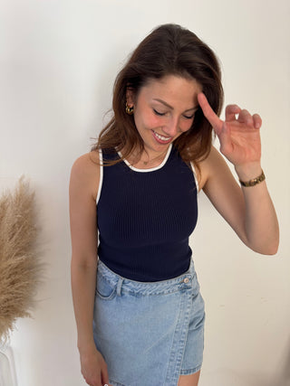 White details navy ribbed top