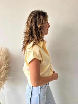 Yellow sleeveless shirt