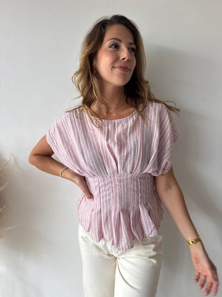 Pink peplum top