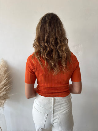 Orange ribbed top