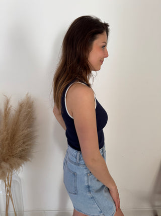 White details navy ribbed top