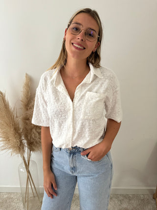 White flowers button top