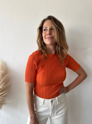 Orange ribbed top