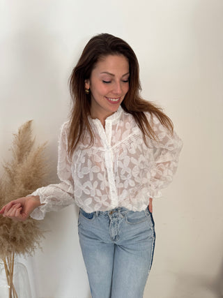 White flowered blouse