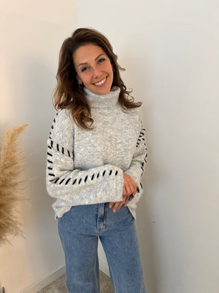 Grey stitched turtleneck knit