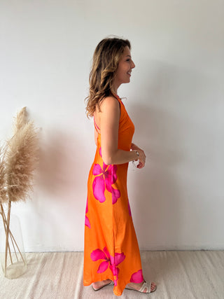 Fuchsia flowers orange dress