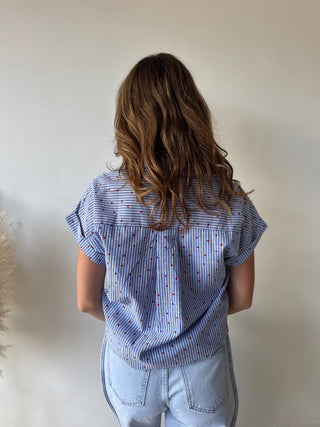 Red hearts blue shirt
