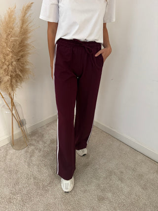 White stripe burgundy pants