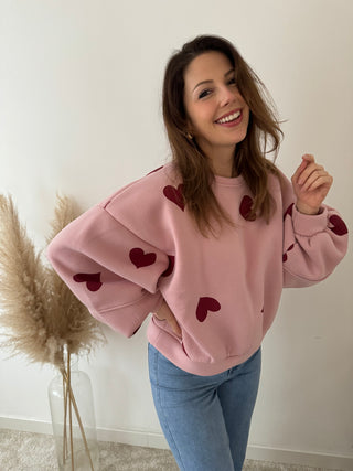 Red hearts pink sweater